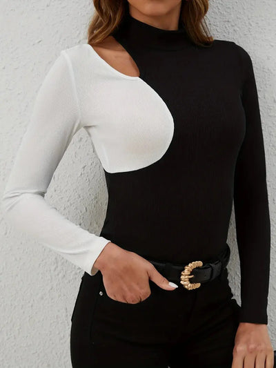 Black and white long sleeve mock neck t-shirt with a cutout detail.