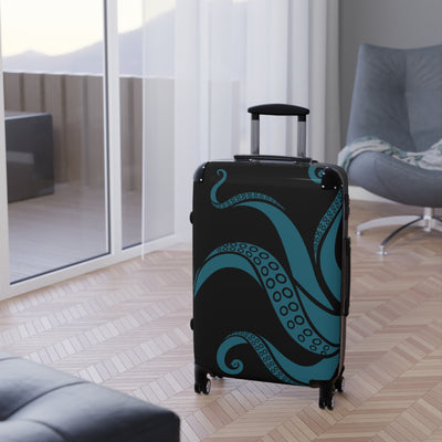 Stylish teal tentacle suitcase in cozy room with modern decor, ideal for personalized travel and luggage needs.