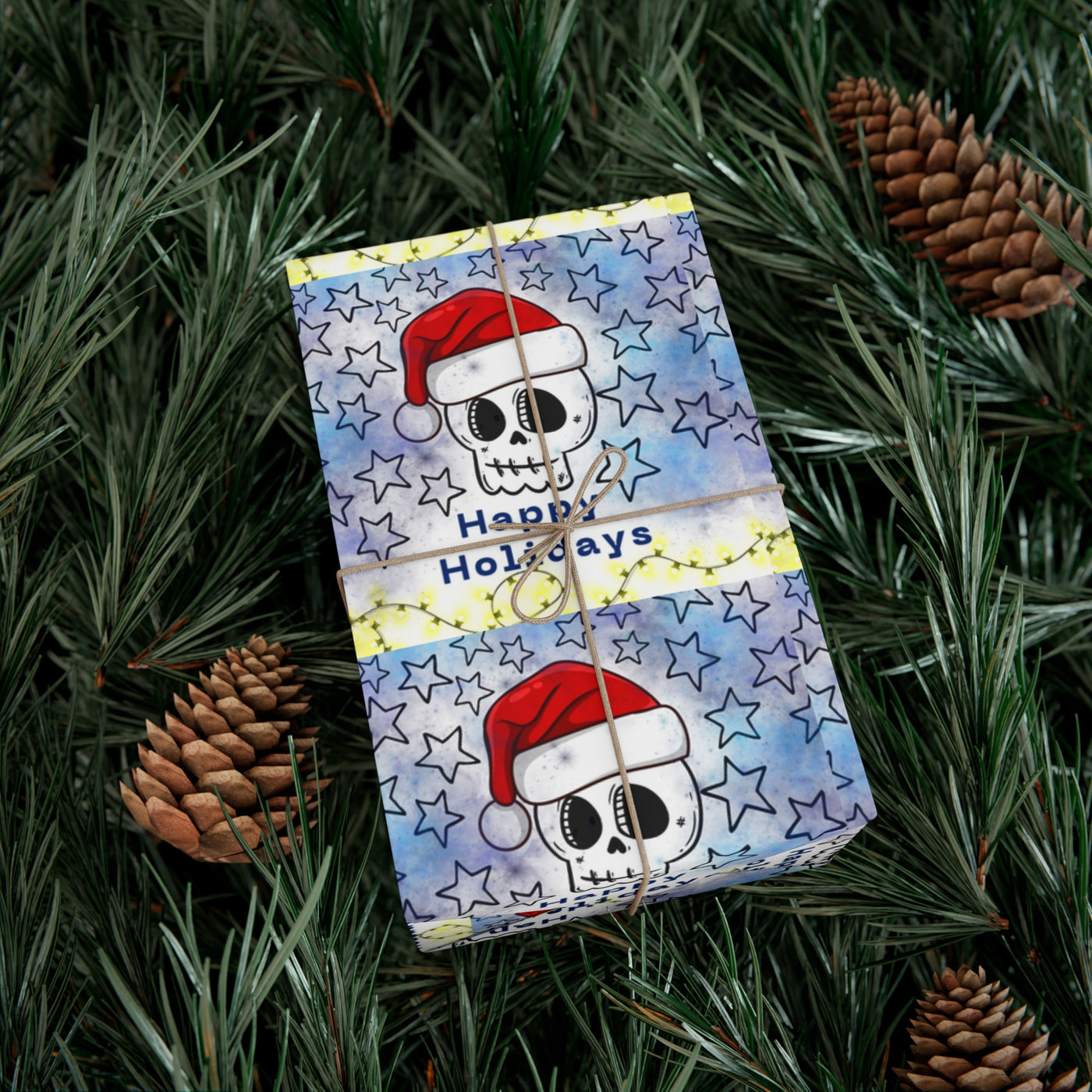 Gift wrap paper with a skull wearing a Santa hat and stars on a blue background.