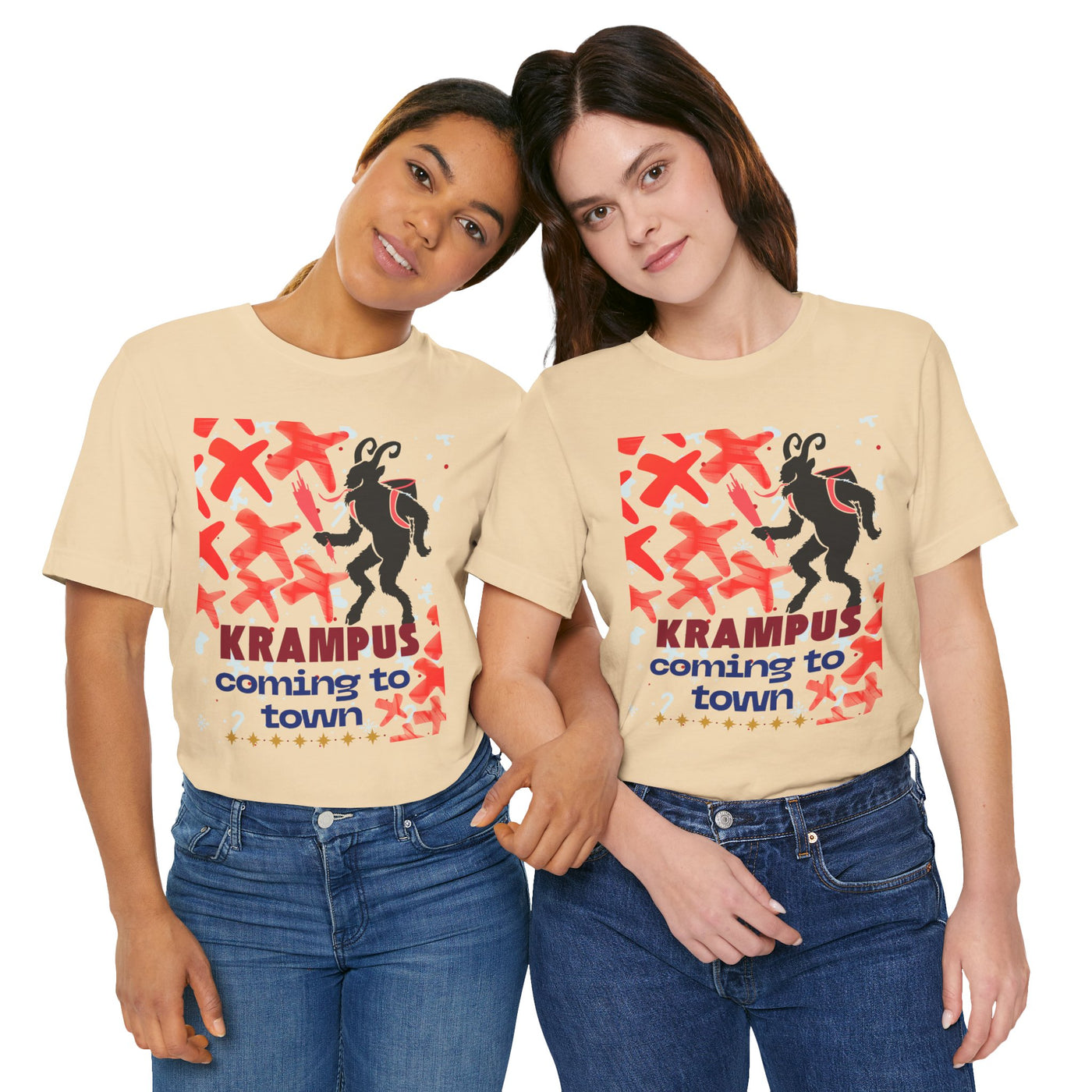 Two women in tan t-shirts with a Krampus graphic and text.