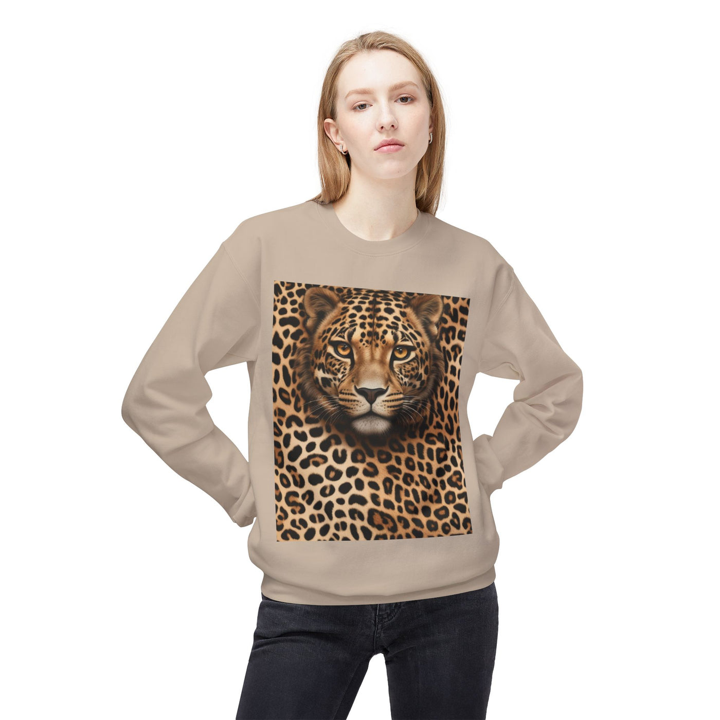 A woman wears a tan sweatshirt with a large cheetah face graphic.