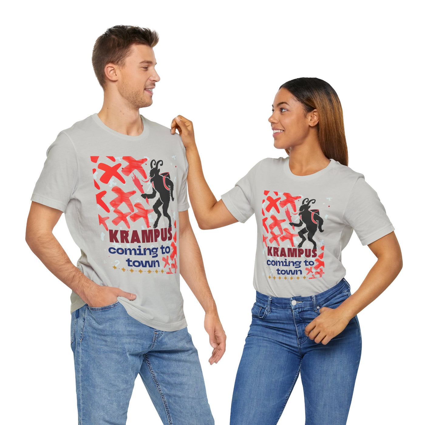 A man and woman wear matching light grey t-shirts with a Krampus graphic.