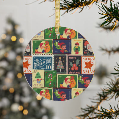 Round acrylic ornament with vintage Christmas stamp designs and a gold ribbon.