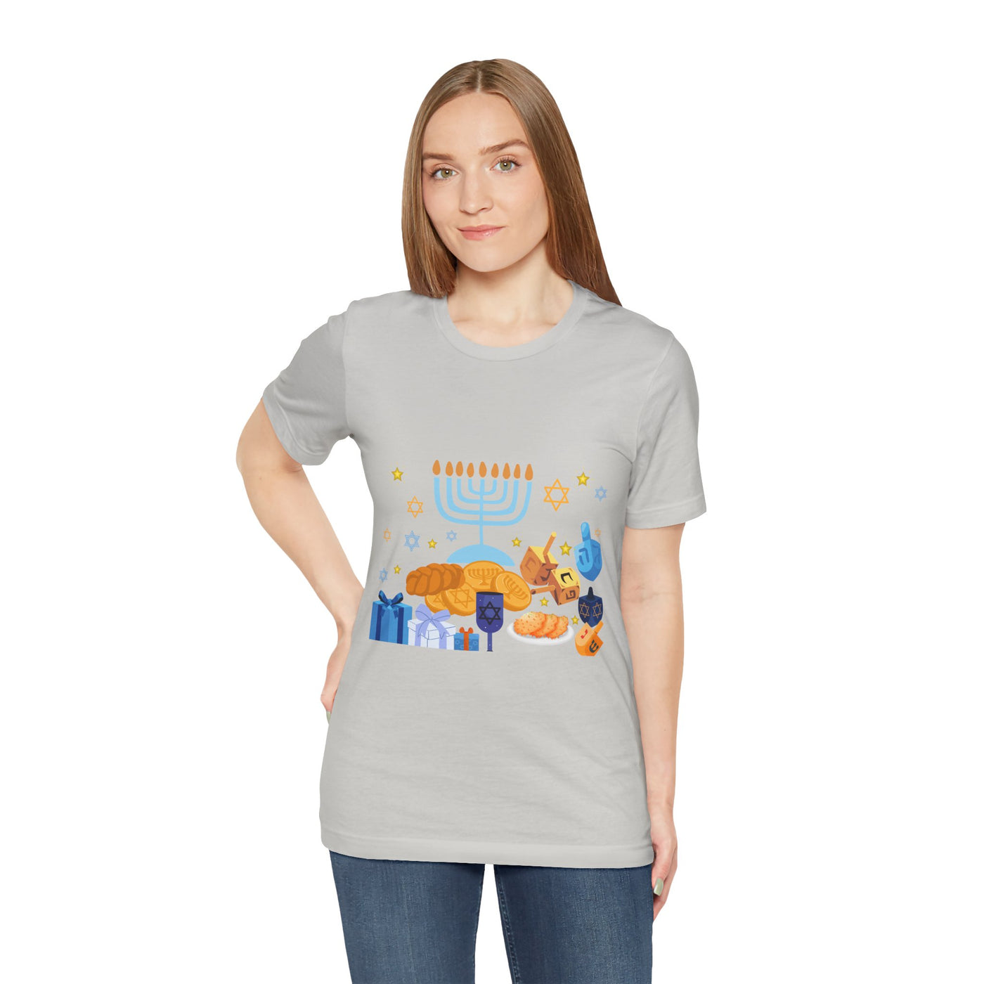 Unisex light grey t-shirt with a Hanukkah graphic featuring a menorah, dreidels, gelt, and sufganiyot.