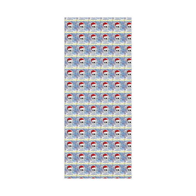 Gift wrap paper with a repeating pattern of skulls wearing Santa hats on a starry background.
