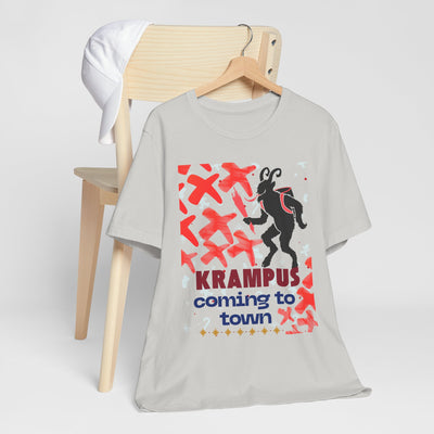 A light grey t-shirt with a Krampus graphic and text.