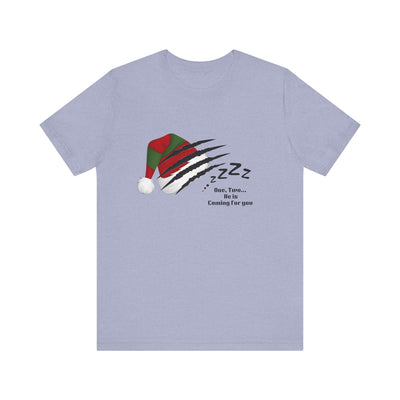 A light purple t-shirt with a graphic of a Santa hat with claw marks and "Zzz" text.