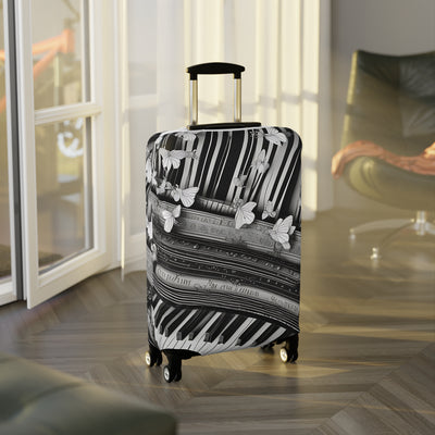 Luggage with a black and white pattern in a room with a window.


