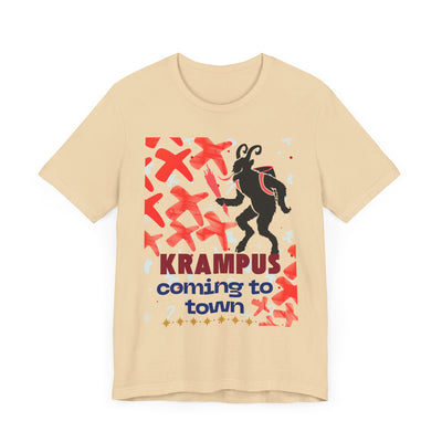 A beige t-shirt with a black Krampus graphic and text that reads "Krampus coming to town".