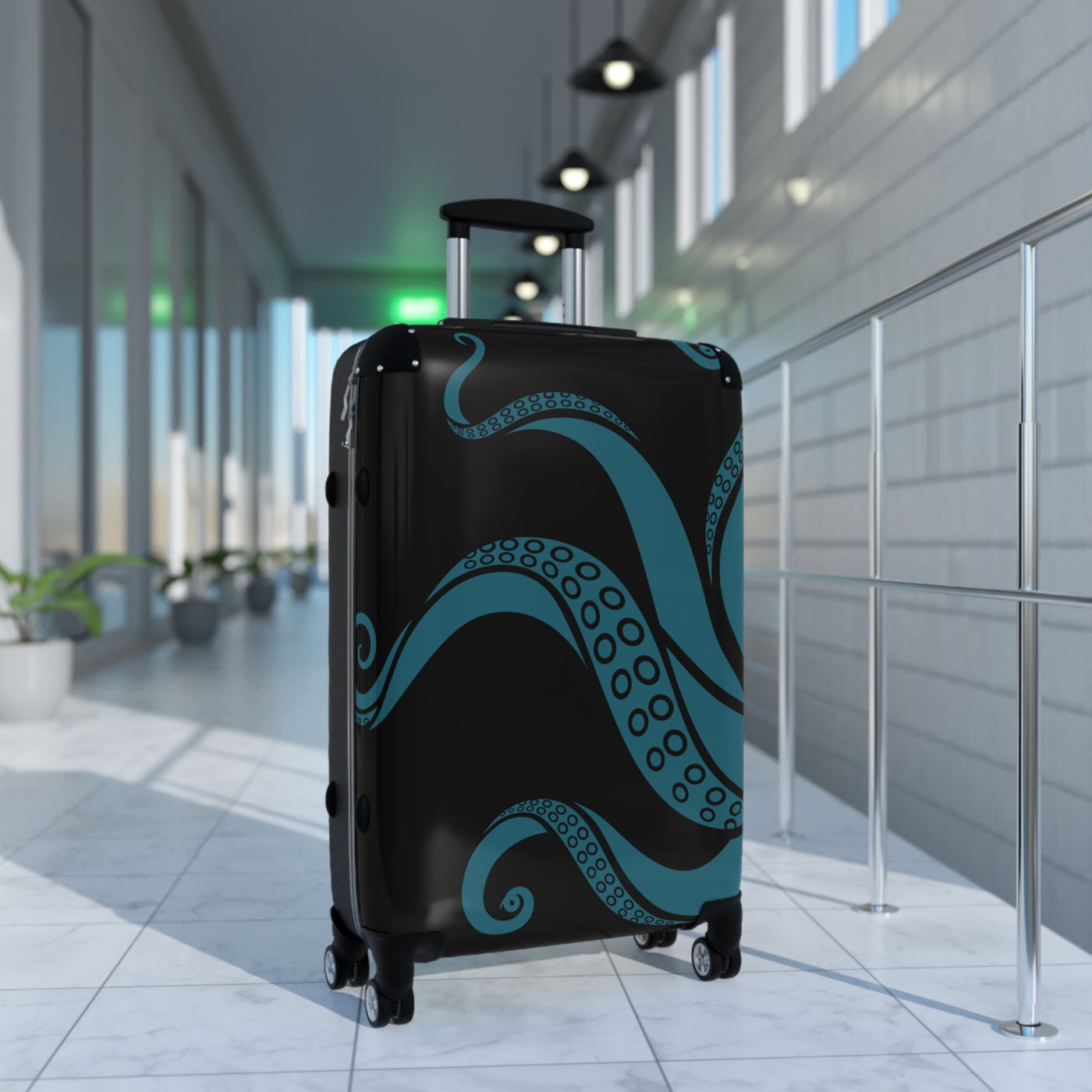 Kraken-themed suitcase with teal tentacles and swivel wheels in bright hallway, perfect for unique travel style.