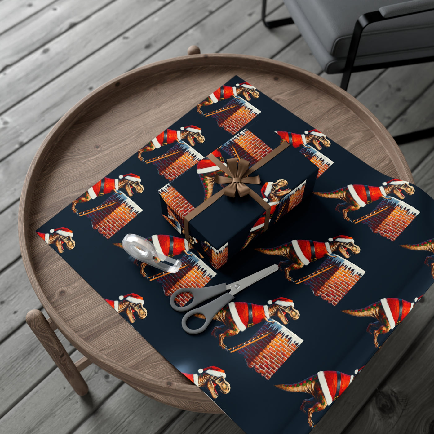 Gift wrap with a dark blue background featuring a repeating pattern of T-Rex dinosaurs in Santa suits climbing brick chimneys.