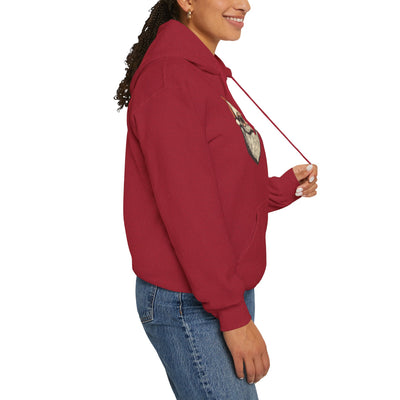 Red hoodie with a gnome graphic on the chest, worn by a woman.
