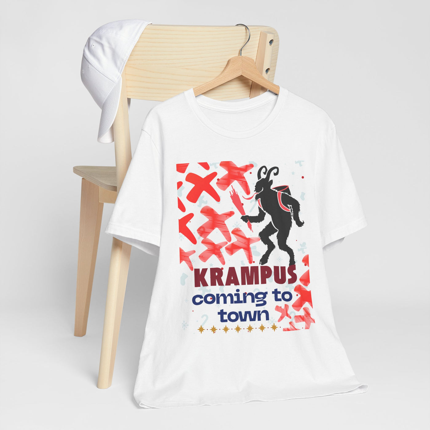 White t-shirt with a black silhouette of Krampus and red accents.