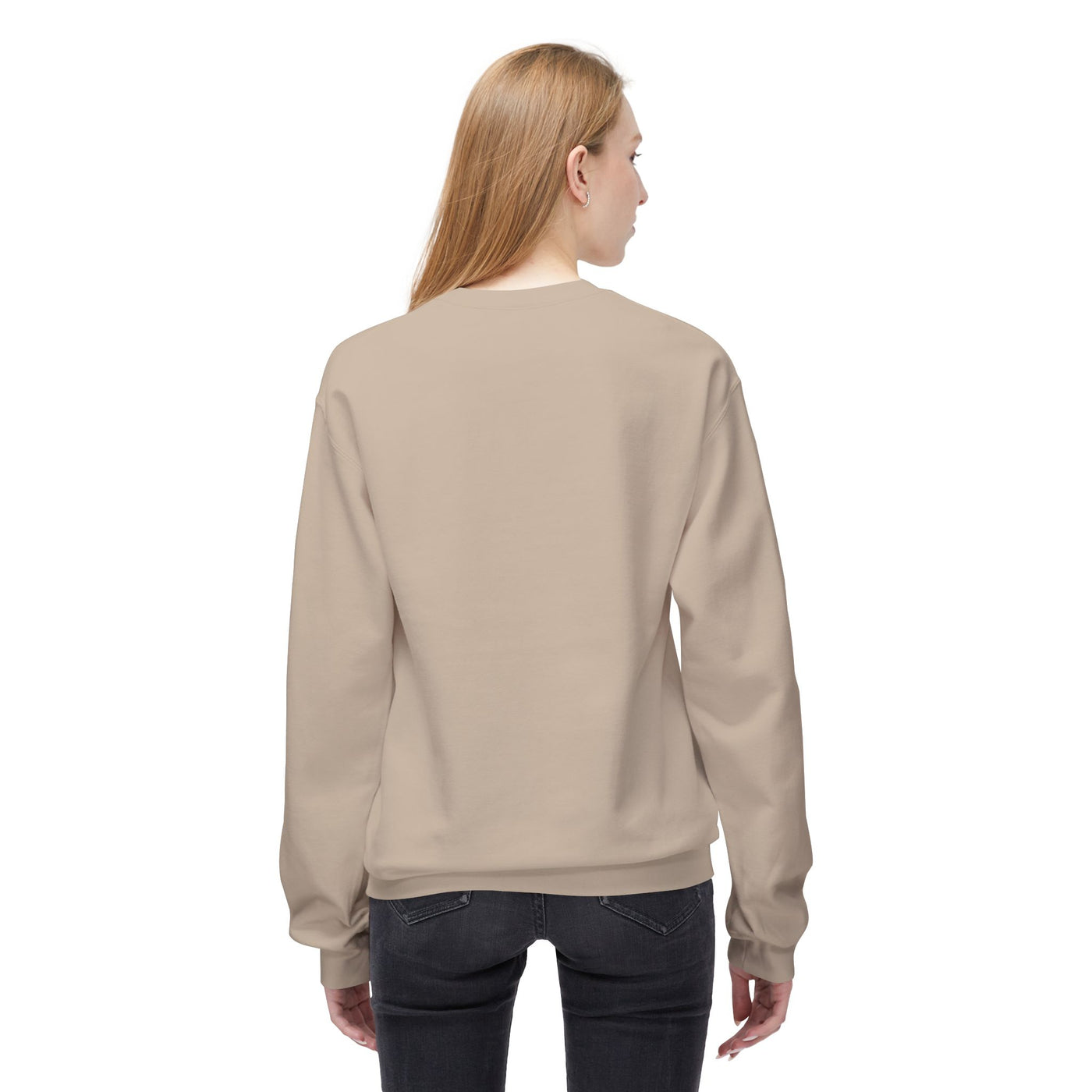 Back view of a woman wearing a tan crewneck sweatshirt.