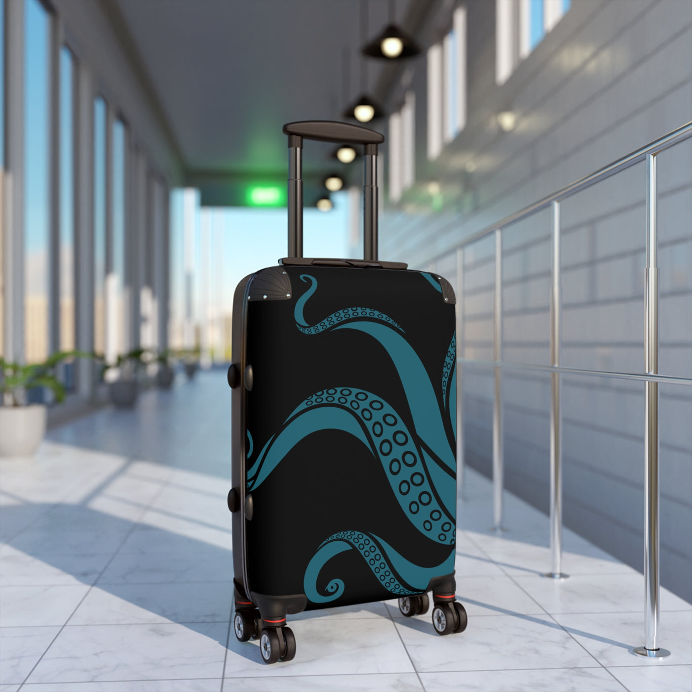 Stylish teal tentacle suitcase with swivel wheels displayed in modern hallway, perfect for ocean-themed travel accessories.
