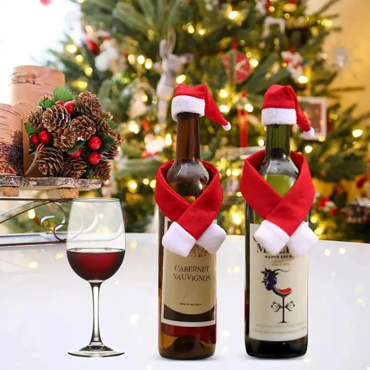 Christmas wine bottle covers with Santa hats and scarves.