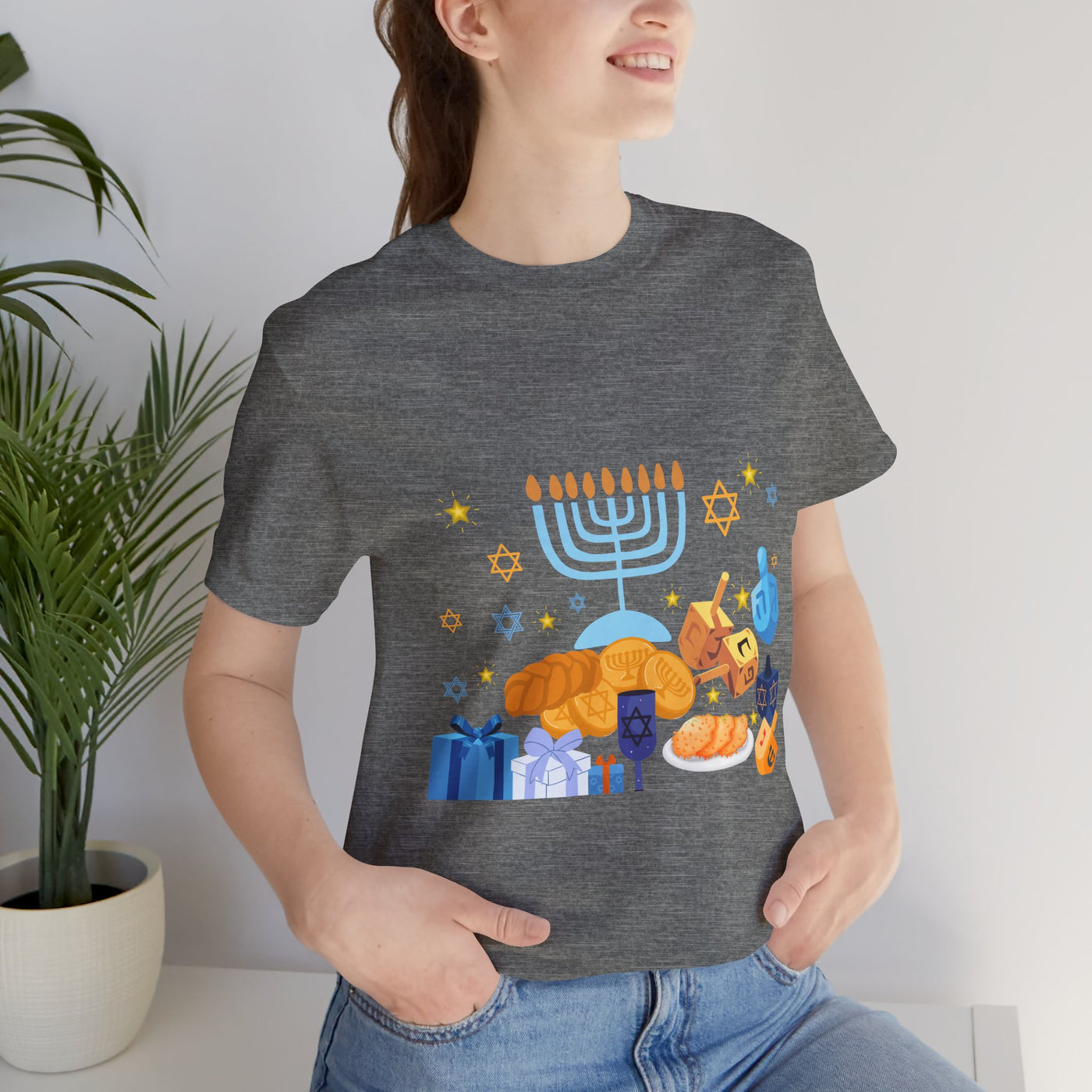 Unisex grey t-shirt with a colorful Hanukkah graphic.