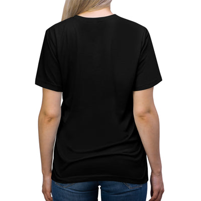 Back view of a black t-shirt on a person wearing jeans.