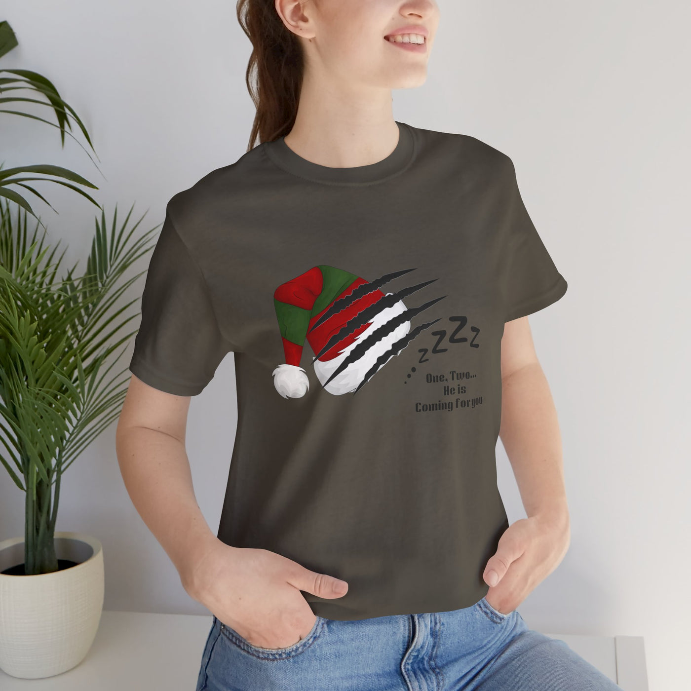 Unisex t-shirt with a Nightmare on Elm Street holiday horror graphic.