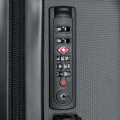 Close-up of TSA lock on large durable suitcase, ensuring secure travel with stylish luggage design.