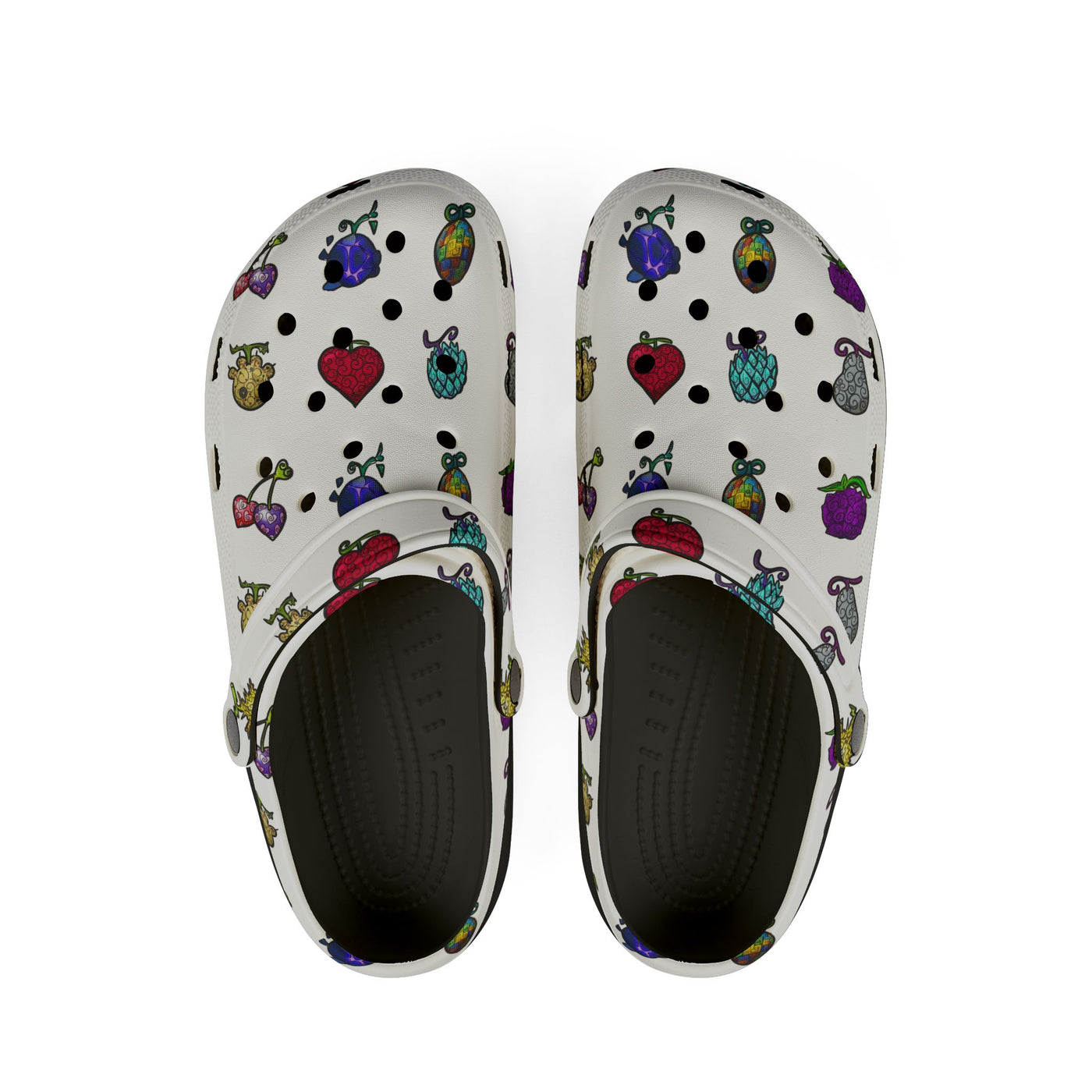 White clogs with a colorful fruit pattern and black soles.