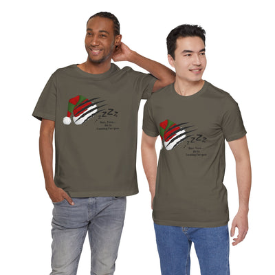 Two men wear olive green t-shirts with a graphic of a Santa hat with claw marks and "One, Two... He is Coming for you" text.