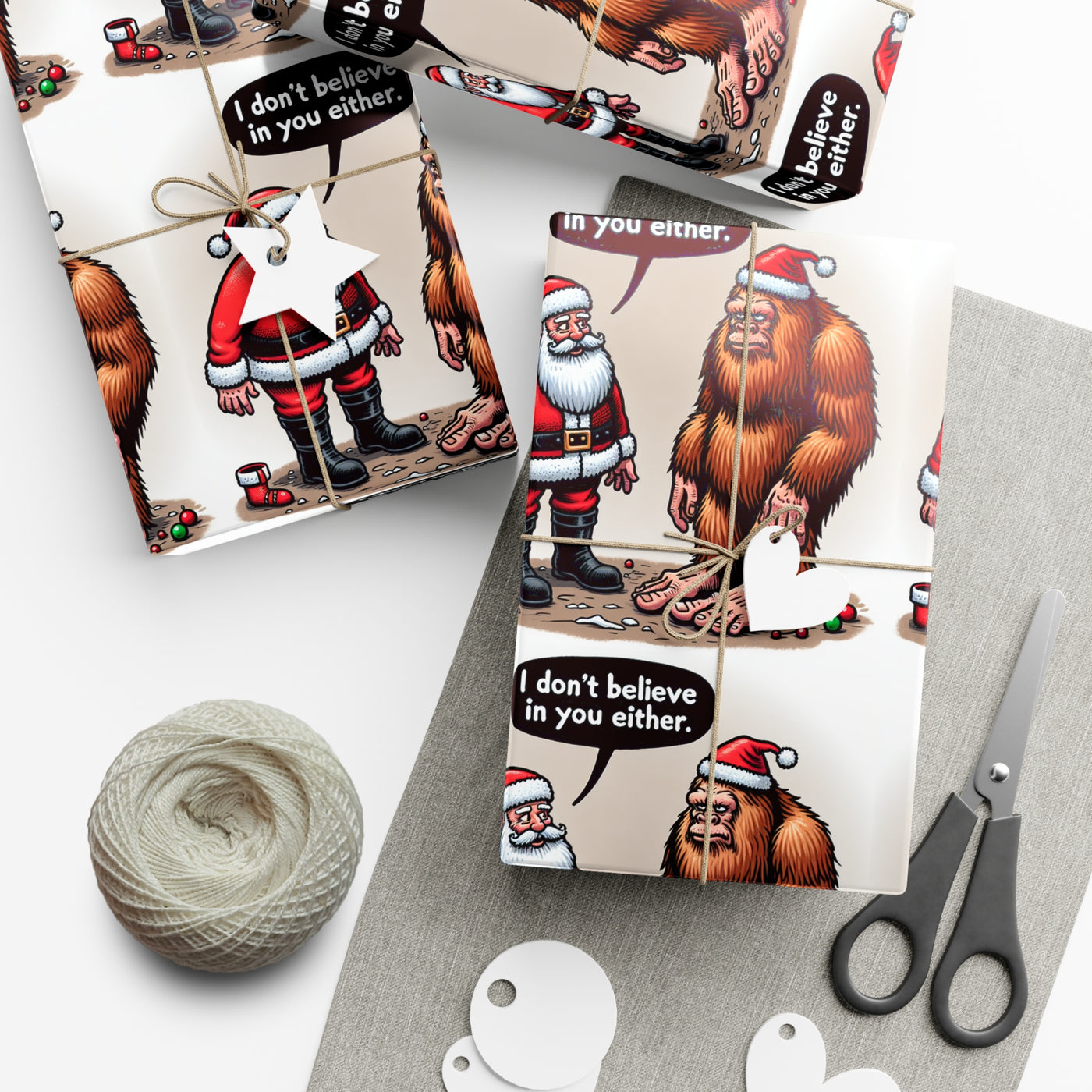 Wrapping paper with Santa and Bigfoot saying "I don't believe in you either".