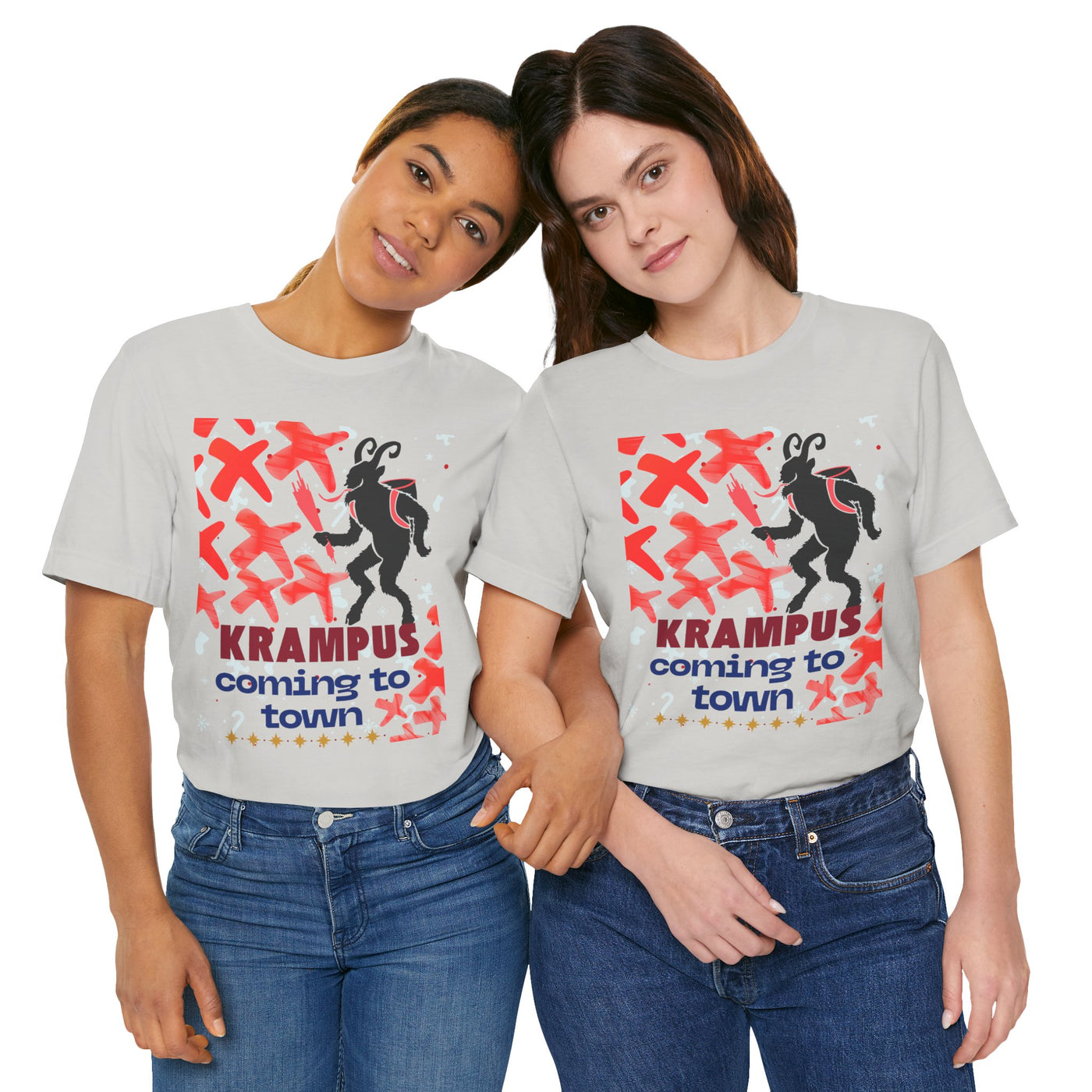 Two women in light grey t-shirts with a Krampus graphic and text.