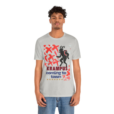 A light grey t-shirt with a graphic of Krampus and the text "Krampus coming to town".