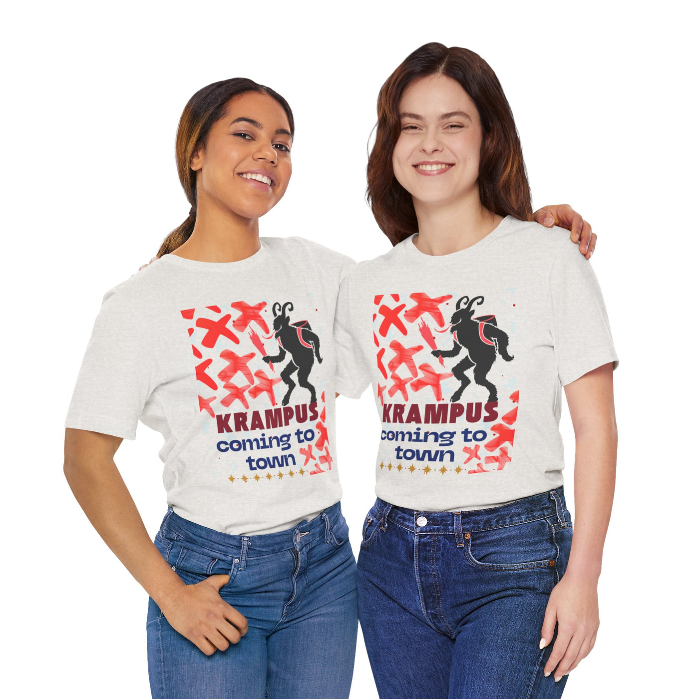 Two women in white t-shirts with a Krampus graphic and text.