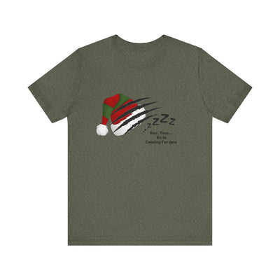A dark green t-shirt with a graphic of a Santa hat with claw marks and "Zzz" text.