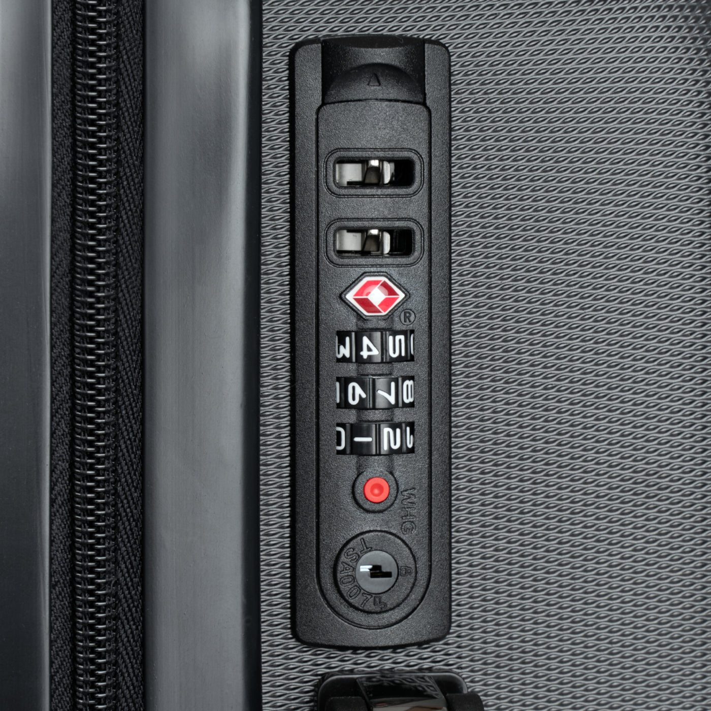 Close-up of TSA-approved safety lock on durable suitcase, ensuring secure travel with personalized luggage.