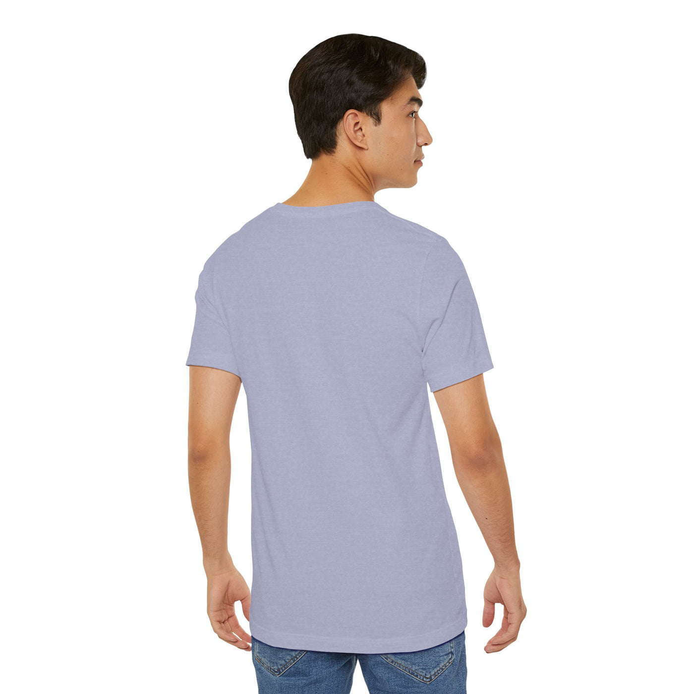 Back view of a man wearing a light purple t-shirt and blue jeans.