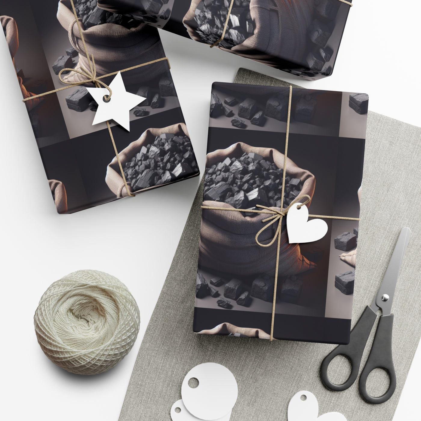 Gift wrap paper featuring a repeating pattern of burlap sacks filled with coal.