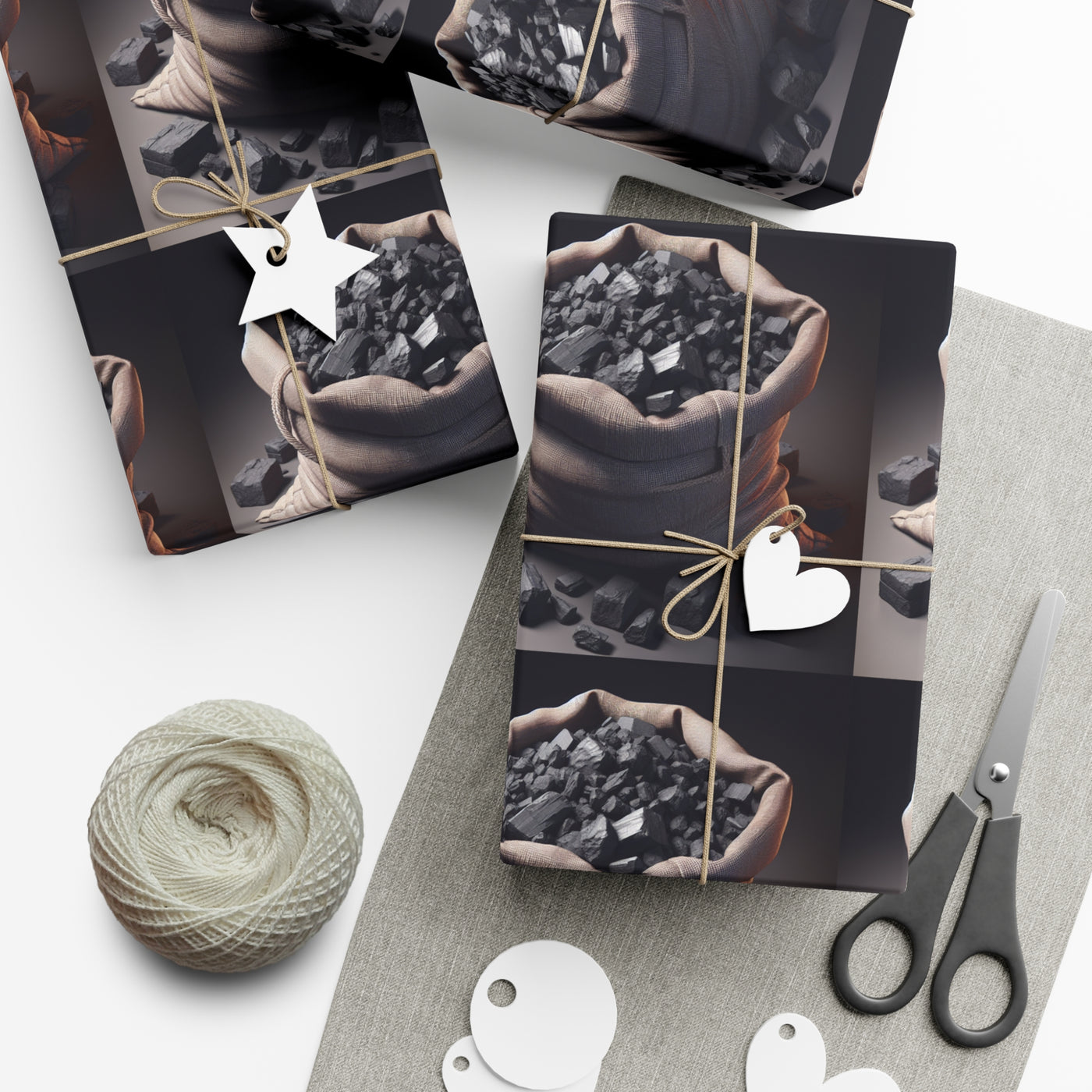 Gift wrap paper with a burlap sack of coal design.