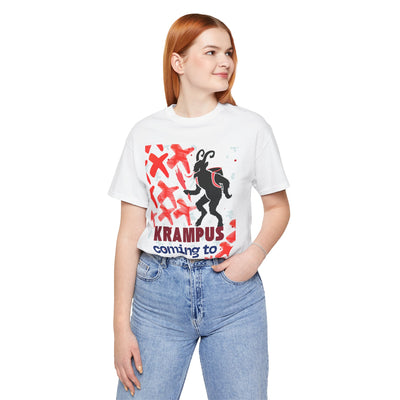 A woman wears a white t-shirt with a Krampus graphic and text.