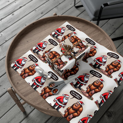 Wrapping paper with Santa and Bigfoot characters and speech bubbles.
