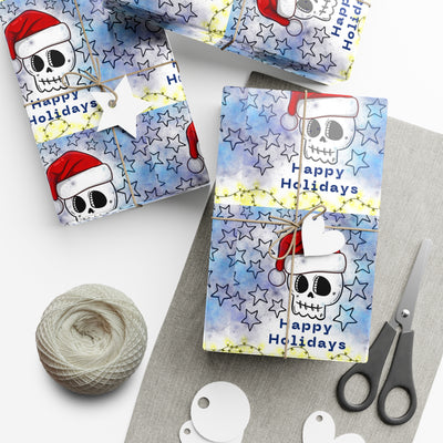 Gift wrap paper with a skull wearing a Santa hat and stars on a blue background.