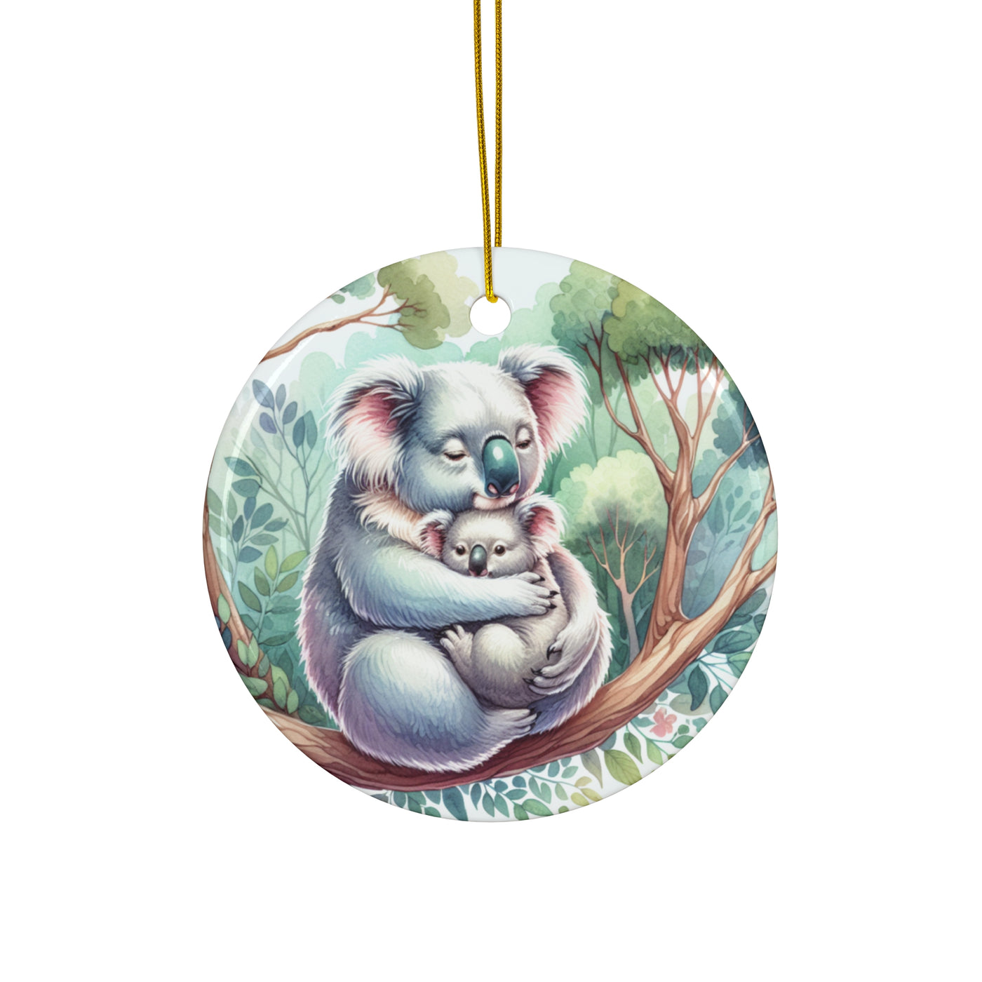 A round ceramic ornament featuring a mother koala hugging her baby on a tree branch.