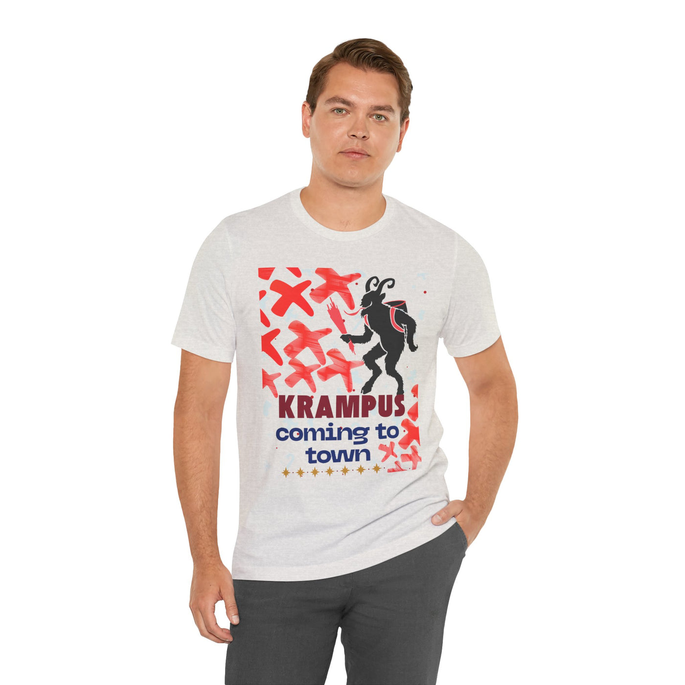 A man wears a light grey t-shirt with a Krampus graphic and text.