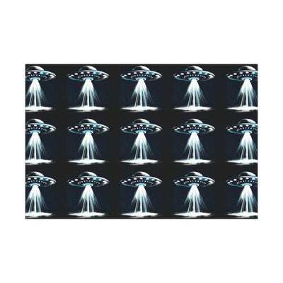 Wrapping paper with a repeating pattern of glowing UFOs beaming light down.