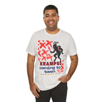 A man wears a light grey t-shirt with a Krampus graphic and text.