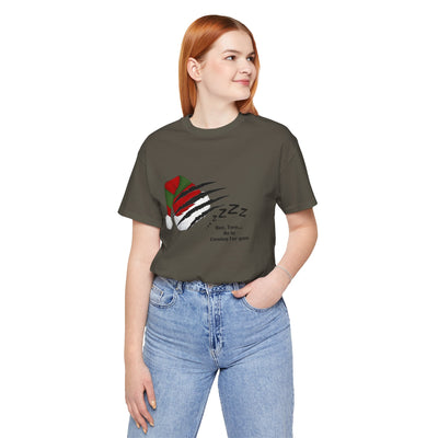 A woman wears a dark green t-shirt with a Nightmare on Elm Street graphic.