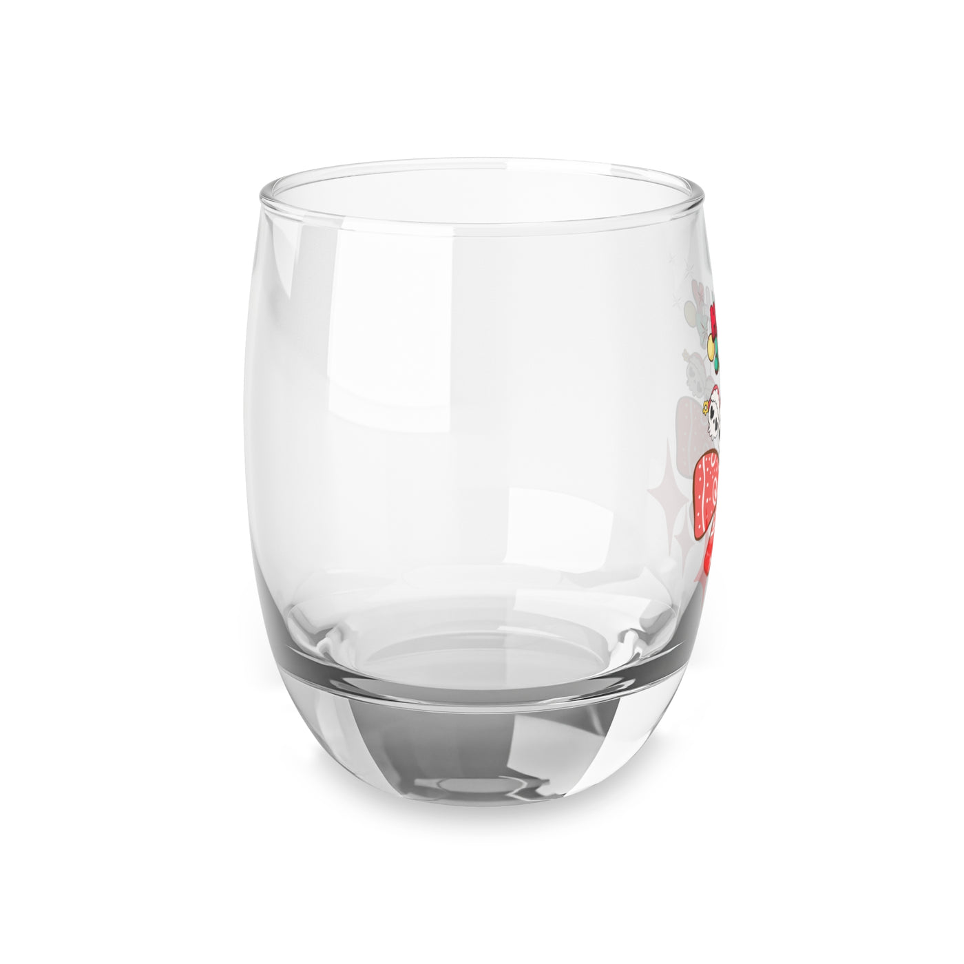 A clear whiskey glass with a festive cherry skull design.