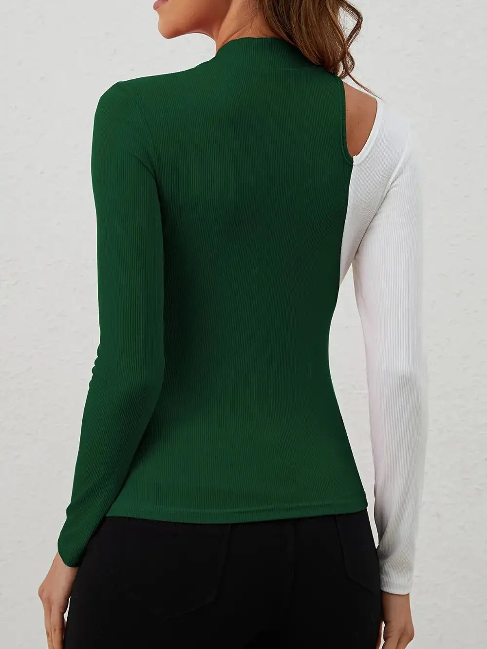 Green and white long-sleeve t-shirt with a cutout shoulder.