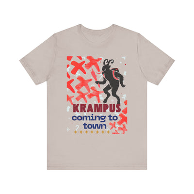 A beige t-shirt with a Krampus graphic and text.