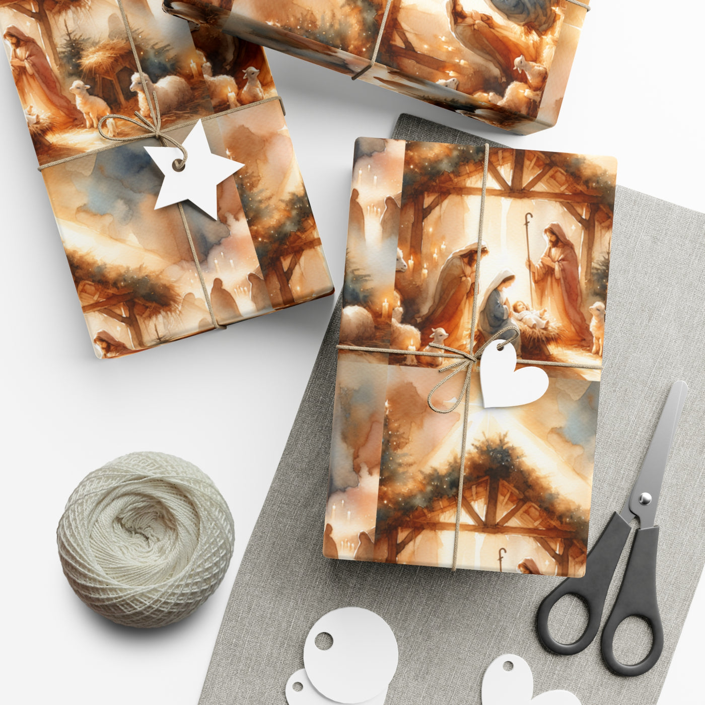 Christmas gift wrap with an elegant nativity scene, tied with twine and tags.