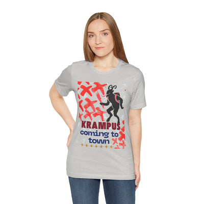 A light grey t-shirt with a black Krampus graphic and "Krampus coming to town" text.