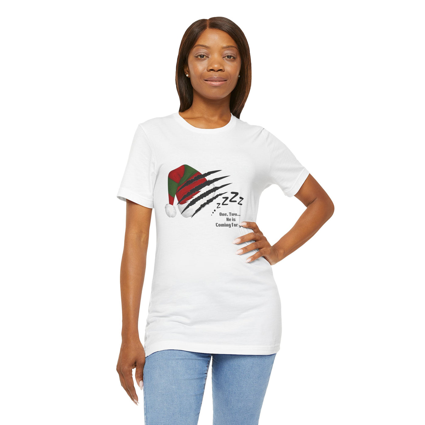 A woman wears a white t-shirt with a Nightmare on Elm Street holiday graphic.