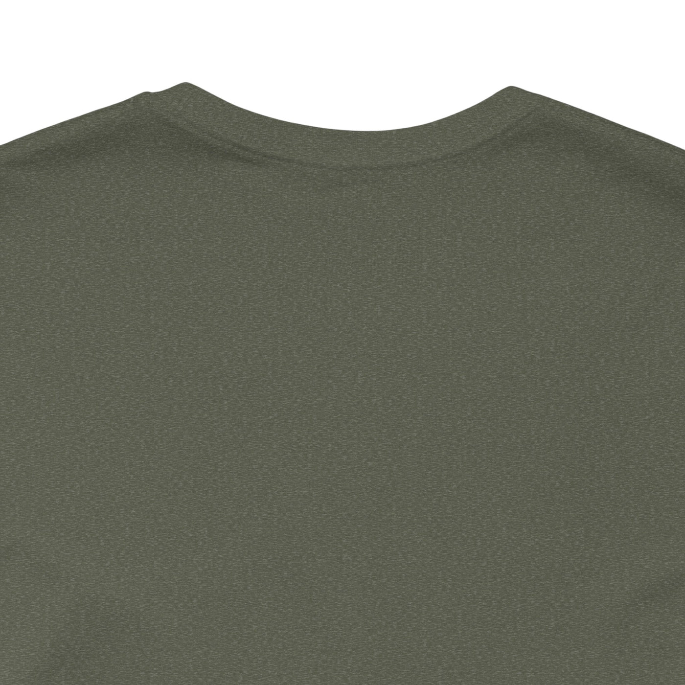 A close-up of a dark green t-shirt with a textured knit.